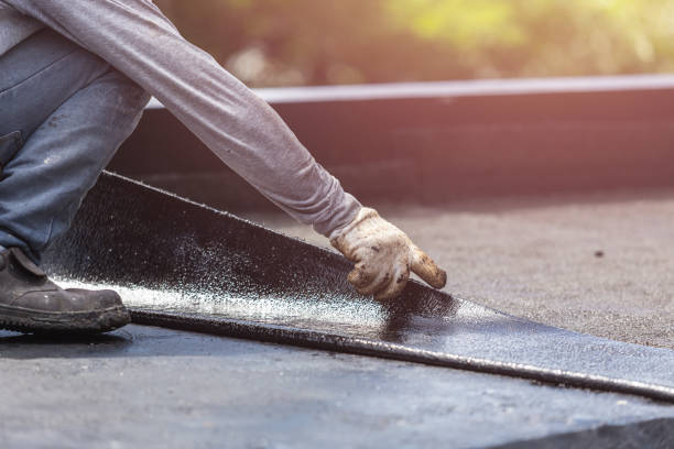 Professional Basement Waterproofing technician working in Lexington, TN